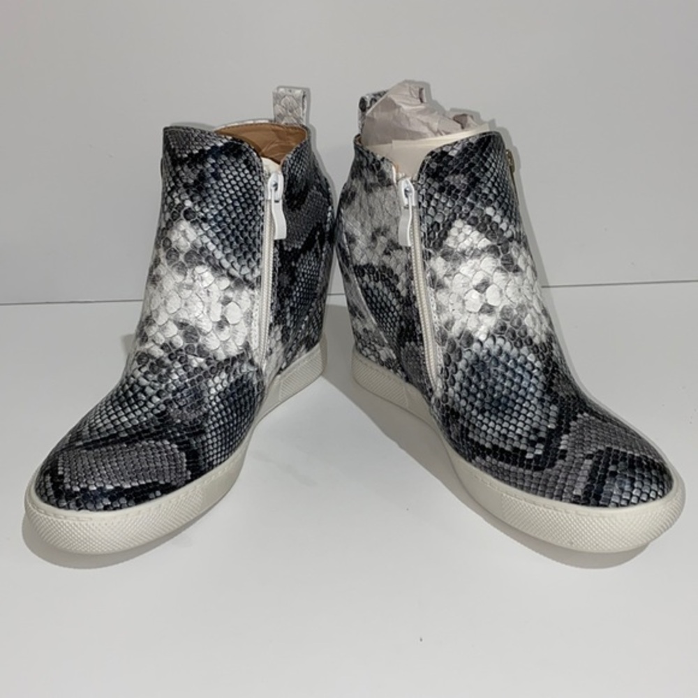High-Top Wedge Sneakers.